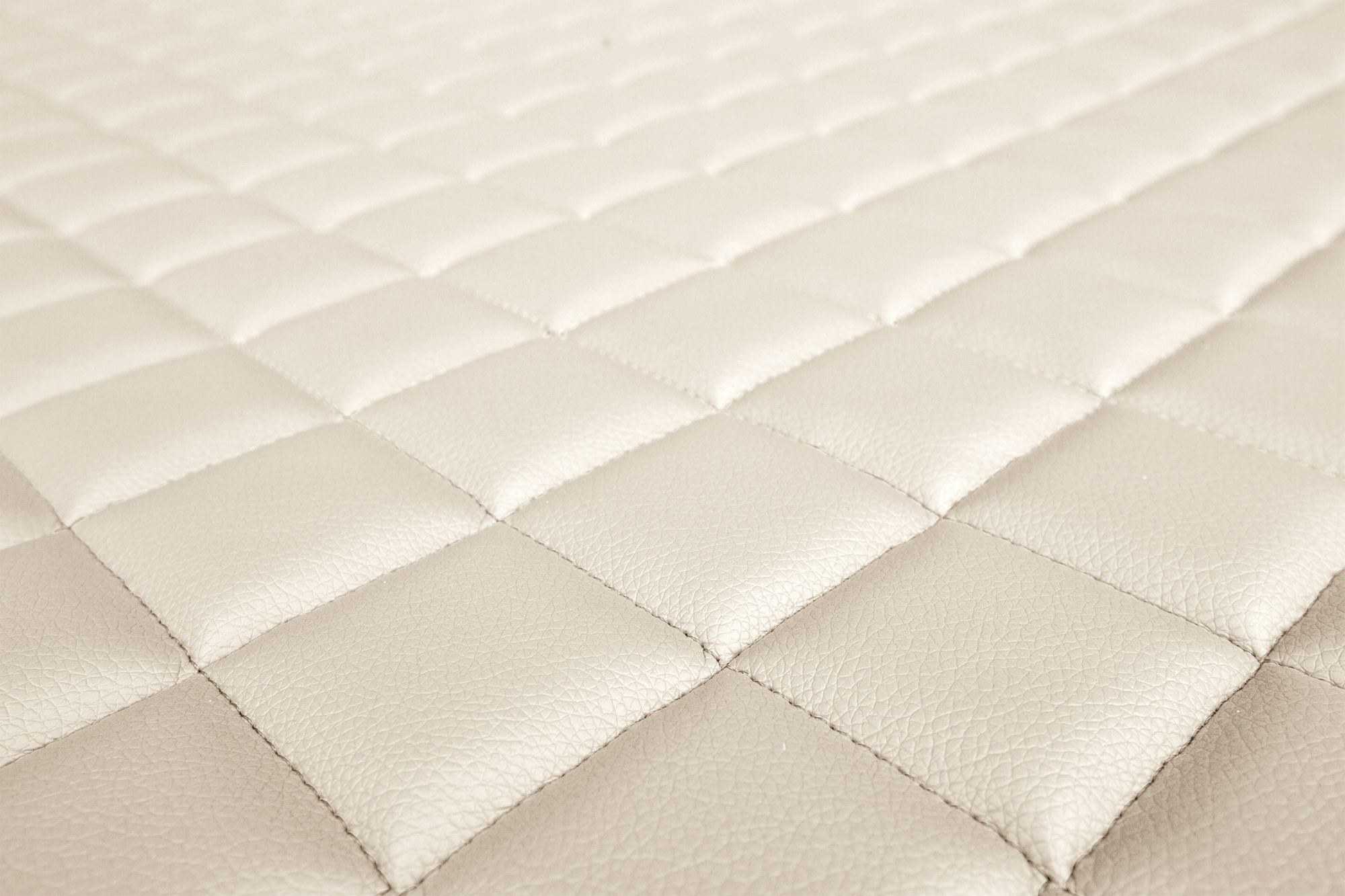 Détail de la surface et du matelassage des housses ELEGANCE Q : Beige clair