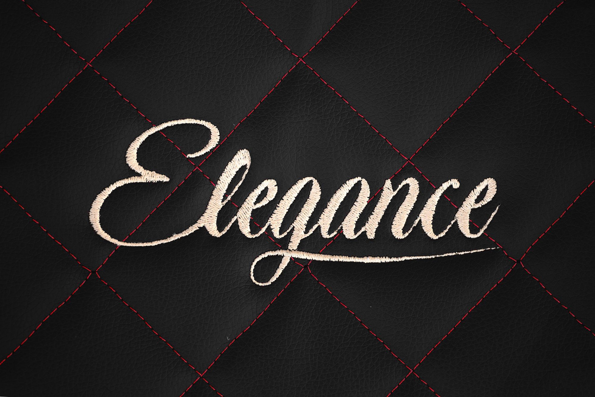 Détail de la broderie Elegance : Noir et rouge